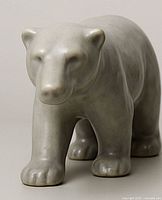 Front view of grey glazed ceramic polar bear