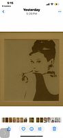 Full view of framed Audrey Hepburn silhouette print with matting and frame