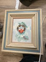 Framed clown portrait front view