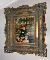 Full view of framed textured print on wall