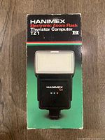 Front of retail box displaying Hanimex TZ-1 flash image and branding