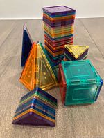 Assorted stacked squares and triangles displayed upright