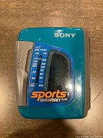 Front view showing Sony Sports Walkman WM-FS191 branding and tuner scale