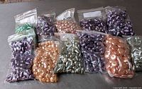 All eleven bags of Czech pearlized beads assorted colours, shapes and sizes