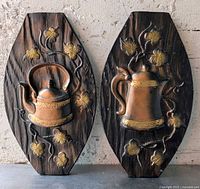 Front view showing both plaques and their designs