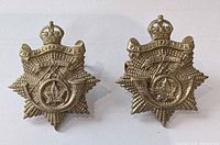 Front view of both Halifax Rifles cap badges