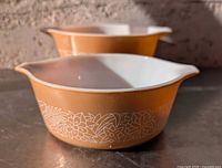 Both Pyrex Woodland casserole dishes angled view