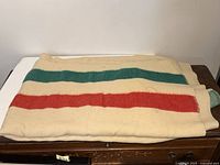 Blanket folded showing full width and stripe pattern