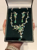 Full view of boxed necklace and earrings set