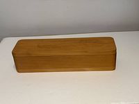 Full view of closed wooden box front