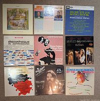 All nine LP album covers laid out in three-by-three grid