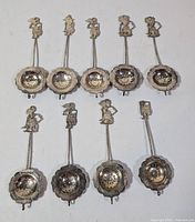 Overview of all nine metal tea strainers
