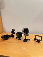 All items grouped on table showing cameras and mounts
