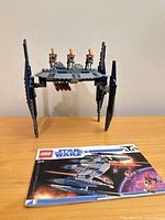 Assembled Hyena Droid Bomber with instruction booklet visible