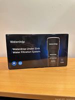 Front of sealed Waterdrop Under Sink Water Filtration System box