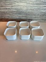 All six white square bowls arranged in two rows