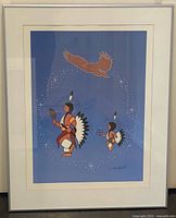 Full view of framed Ken Syrette print under glass