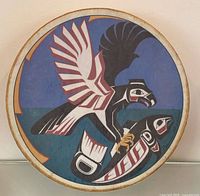 Front of drum showing Haida eagle and salmon painting