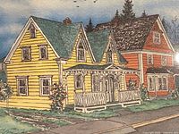 Closer view of yellow and red houses left side