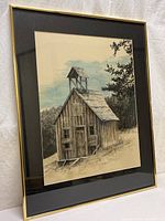 Full view of framed watercolor painting