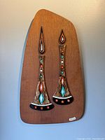 Full view of Chalvignac wood plaque with ceramic inlays