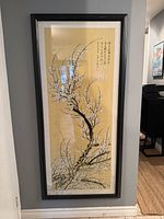 Full front view of framed Asian plum blossom painting