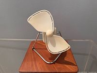 Front angled view of Caframo 707 Chinook fan on wooden base showing blades and stand