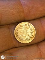 Reverse of 1919 Canada 10 cents coin showing crown, wreath, denomination and date