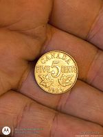 Reverse showing CANADA, numeral 5, maple leaves, date 1935