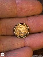 Reverse side showing date and denomination