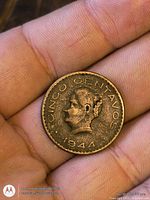 Obverse showing CINCO CENTAVOS legend, Cuauhtémoc bust and 1944 date visible