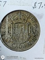 Reverse side of 1957 half crown coin showing crowned shield and date