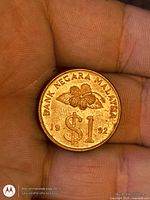 Obverse showing hibiscus, denomination $1, date 1992