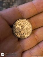 Obverse of 1943 2 Francs coin showing denomination and legend