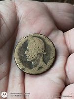 Obverse with worn left-facing bust