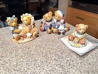 All three Cherished Teddies figurines on countertop