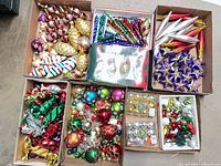 All boxes of assorted ornaments overview