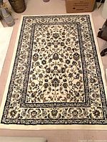 Full view of VALLÖBY rug laid flat showing overall pattern and size