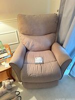 Front view of beige La-Z-Boy power recliner