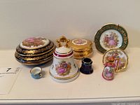 Group shot of all nine Limoges pieces