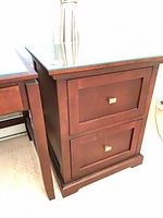 Front and side view of two-drawer maple finish file cabinet