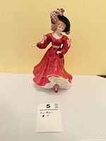 Front view of Royal Doulton "Patricia" figurine standing on table
