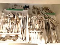 Full drawer organizer showing majority of flatware pieces