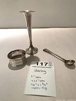 Bud vase, spoon, napkin ring with size note
