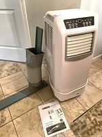 Portable AC unit with exhaust kit and manual