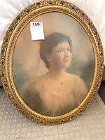 Full view of oval framed portrait