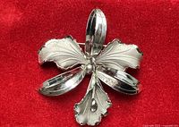 Front view of sterling silver flower brooch