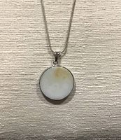 Close-up of amazonite pendant cabochon