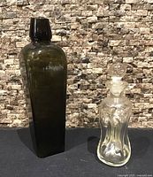 front view of both bottles showing size and form