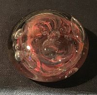 Top view showing orange swirl pattern and bubbles